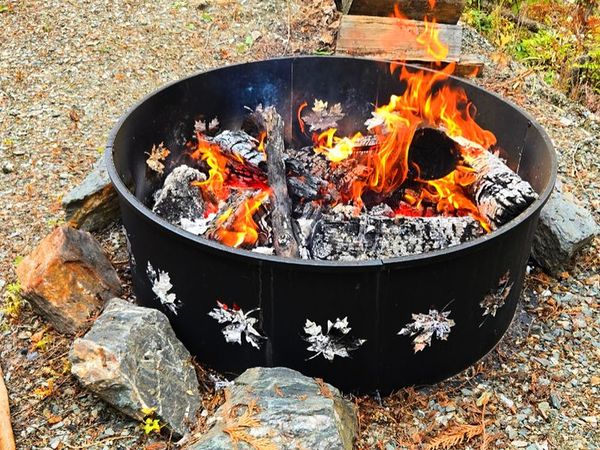 Fire burning in the fire ring on Lot 117